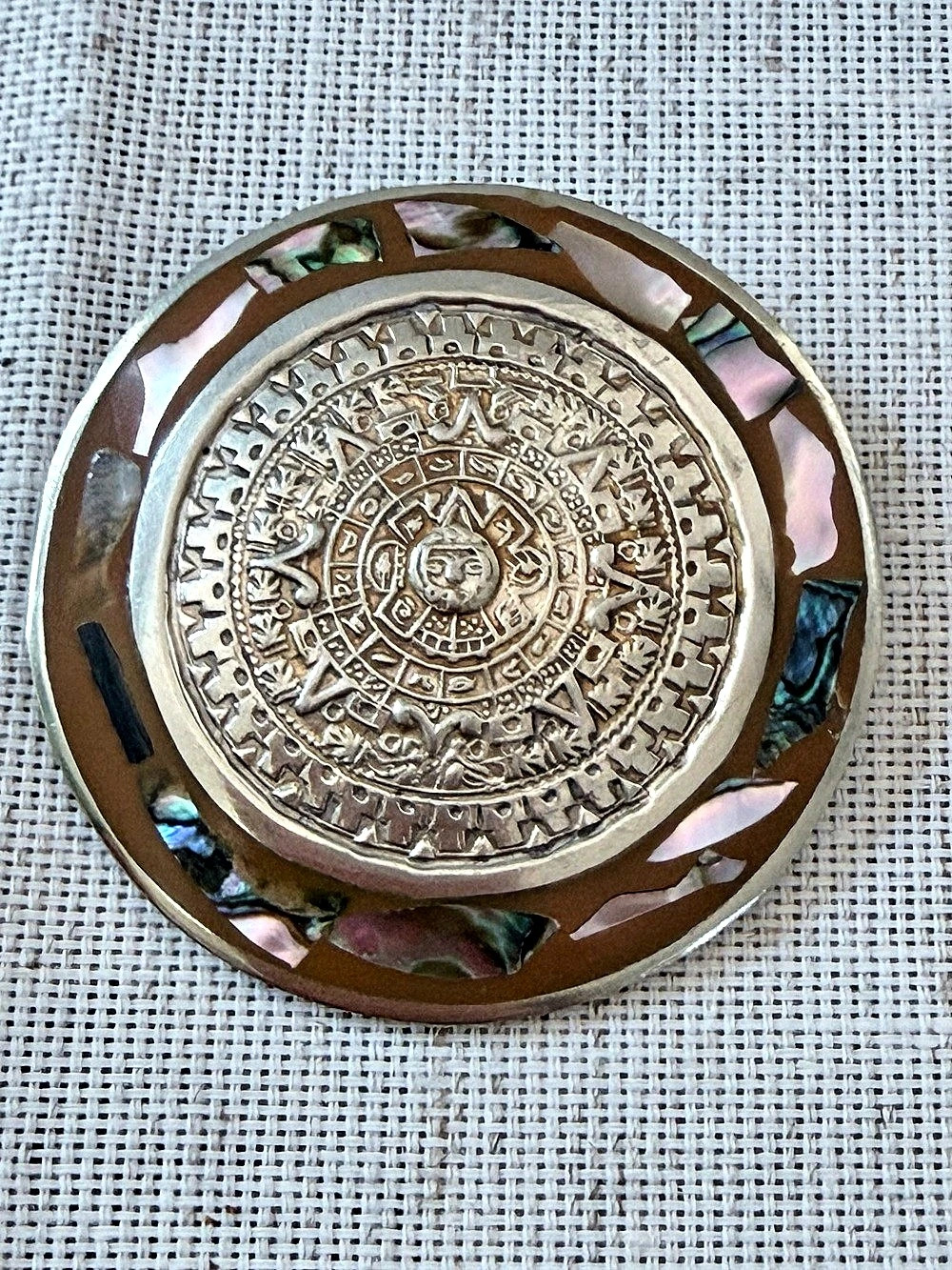 vintage Mexican alpaca silver and abalone shell Aztec calendar brooch and pendan